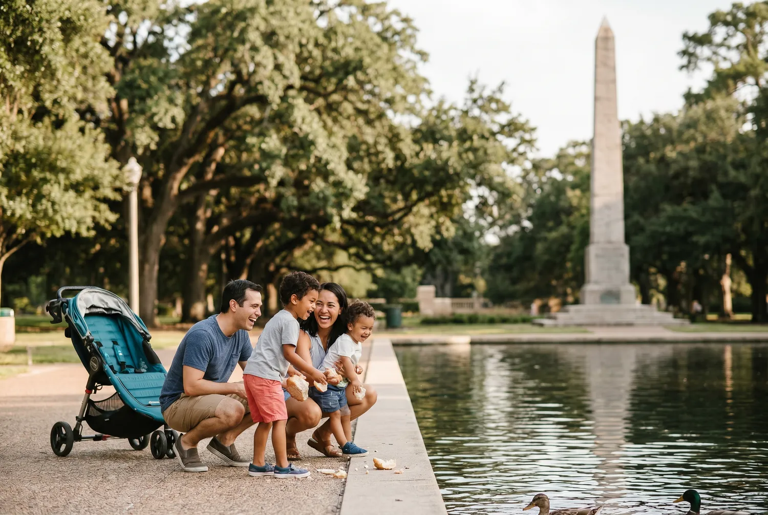 Family strolling the reflection pool at Hermann Park in Houston Family strolling the reflection pool at Hermann Park in Houston