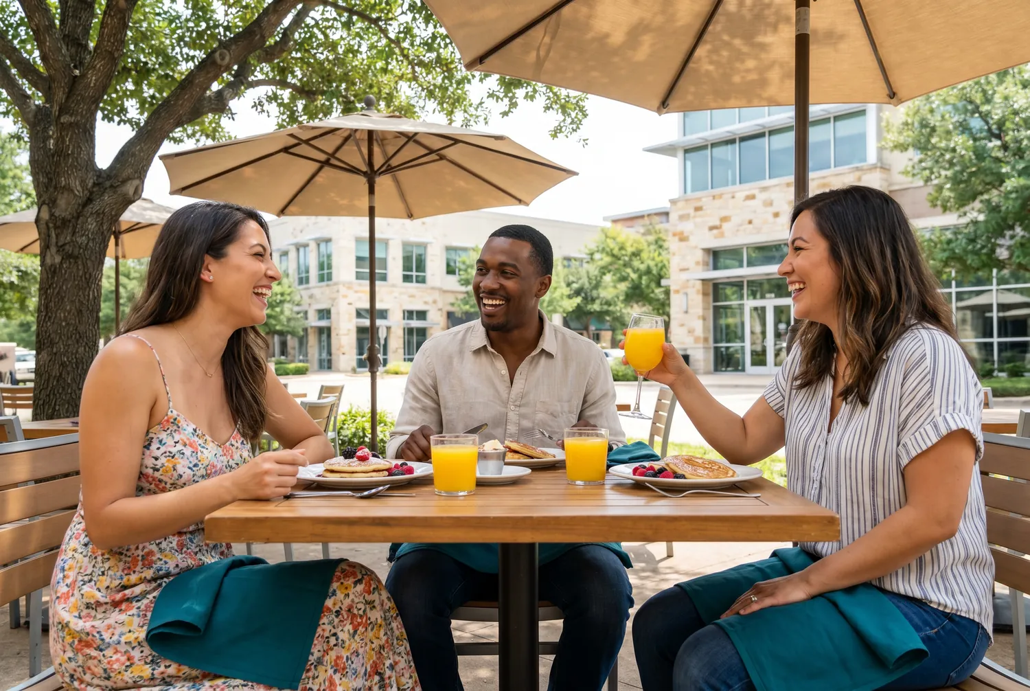 Friends at weekend brunch on a stylish Plano patio Friends at weekend brunch on a stylish Plano patio